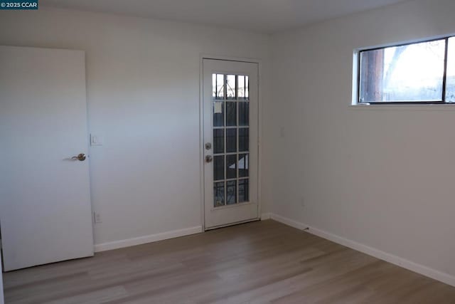 doorway featuring light hardwood / wood-style flooring