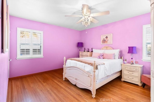 bedroom featuring ceiling fan and light hardwood / wood-style floors