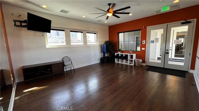 entrance foyer featuring ceiling fan, dark wood-type flooring, and french doors