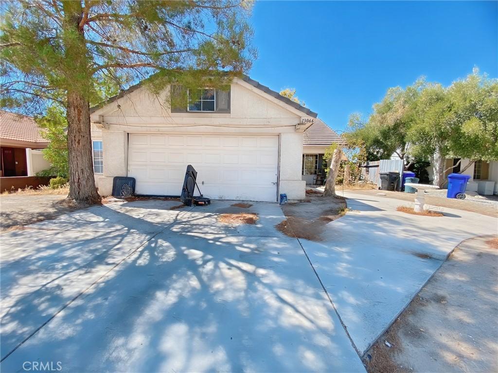 view of side of home featuring a garage