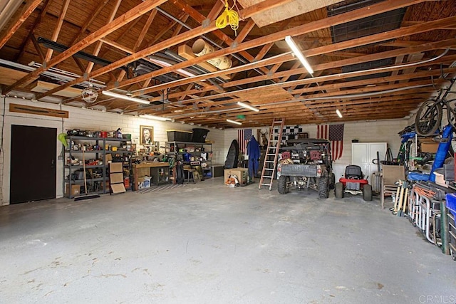 garage featuring a workshop area