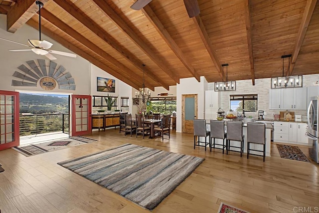 unfurnished living room featuring a healthy amount of sunlight and light wood-type flooring