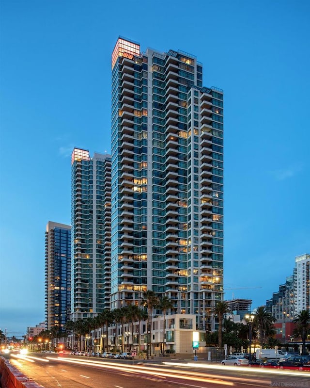 view of outdoor building at dusk