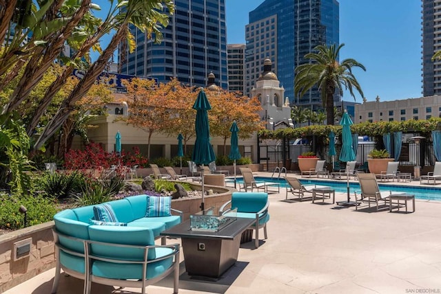 view of patio featuring an outdoor fire pit