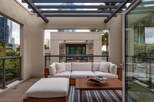 balcony featuring an outdoor living space and a pergola