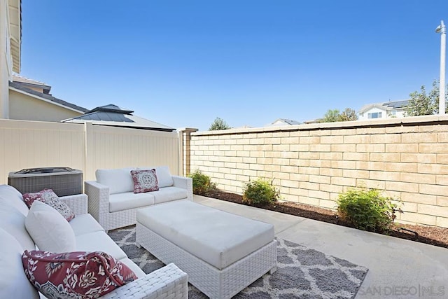 view of patio / terrace featuring central air condition unit and outdoor lounge area