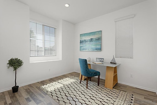 home office featuring hardwood / wood-style floors