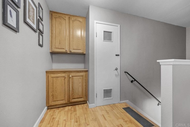 8115 Cacus, Spring Valley, CA 91977 - hallway with an upstairs landing and light wood-style floors