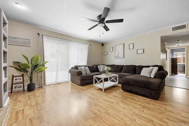 8115 Cacus, Spring Valley, CA 91977 - living area featuring light wood finished floors and a ceiling fan