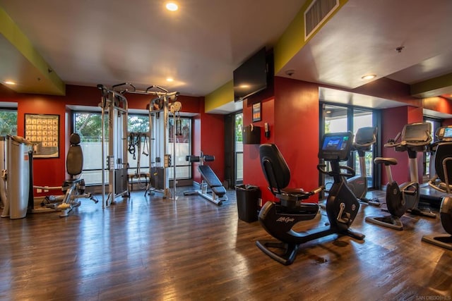 gym with hardwood / wood-style floors