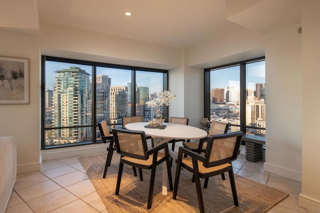 dining space with light tile patterned floors