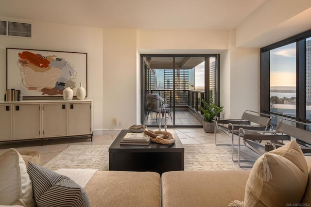 living room with light tile patterned flooring