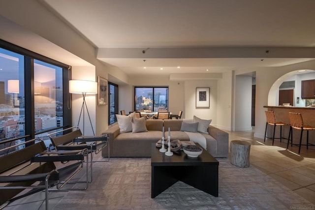 living room with tile patterned floors