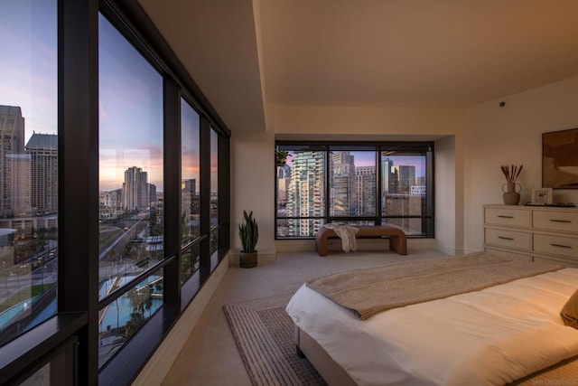 bedroom featuring light carpet