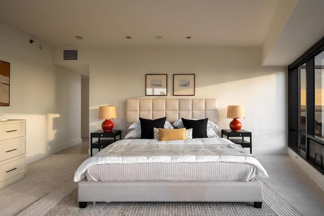 bedroom with light colored carpet