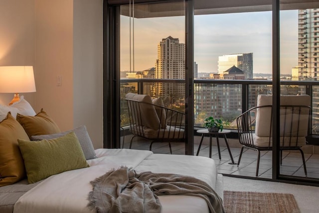 bedroom featuring a wall of windows