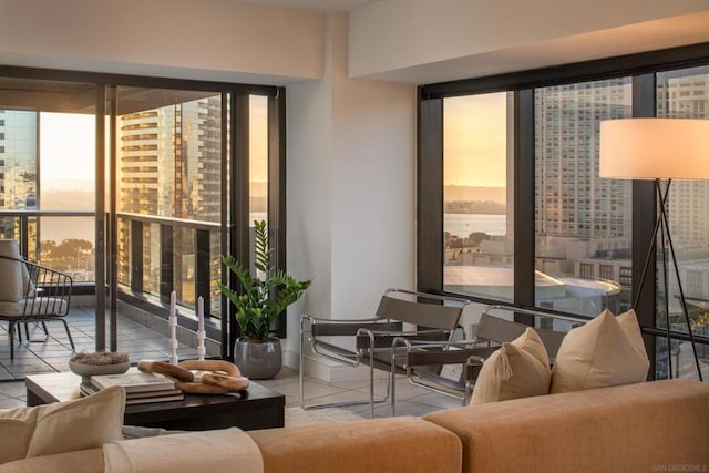 living room with light tile patterned floors and a healthy amount of sunlight