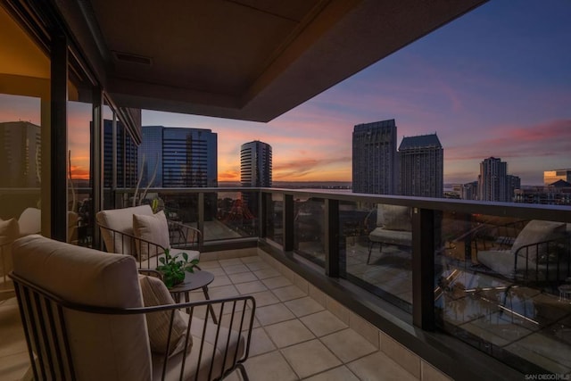 view of balcony at dusk