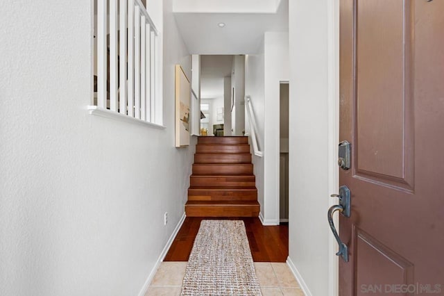 entryway featuring light tile patterned flooring