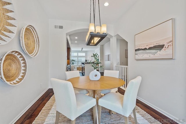 dining room featuring dark hardwood / wood-style flooring