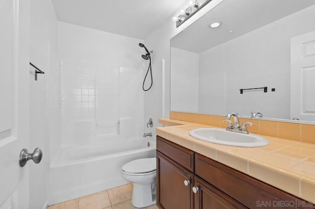 full bathroom featuring toilet, bathtub / shower combination, tile patterned flooring, and vanity