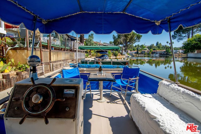 view of patio / terrace featuring a water view