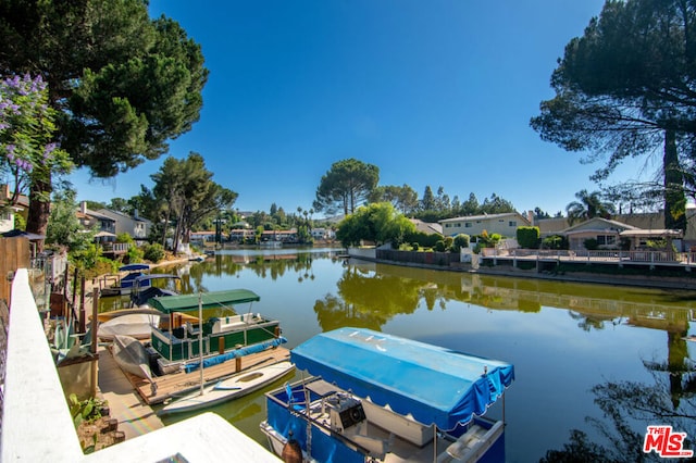 view of dock with a water view