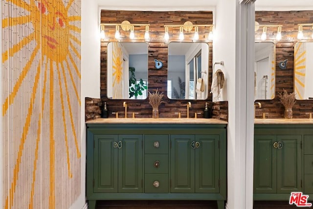 bathroom with rustic walls and vanity