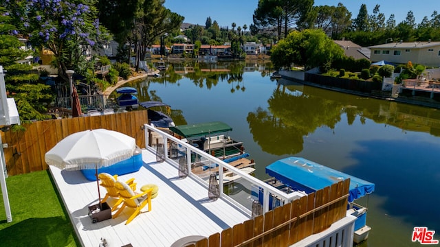 view of dock with a water view