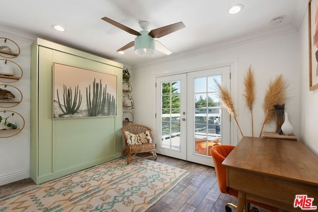 sitting room with ceiling fan, hardwood / wood-style floors, crown molding, and french doors