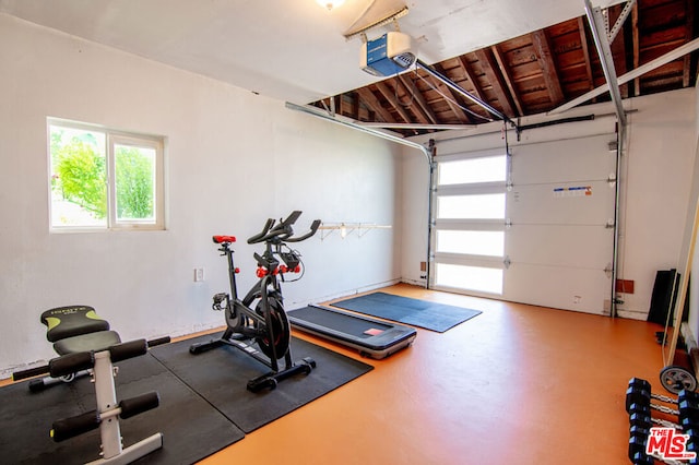 exercise room with lofted ceiling