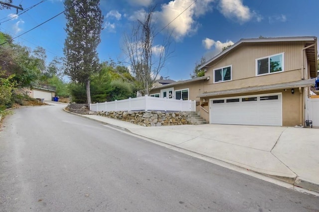 view of front of home featuring a garage