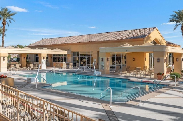 view of pool featuring a patio area