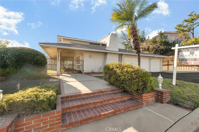 view of front of house featuring a garage