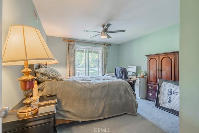 carpeted bedroom featuring ceiling fan