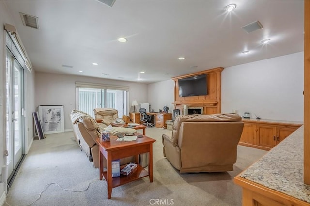 living room with light colored carpet