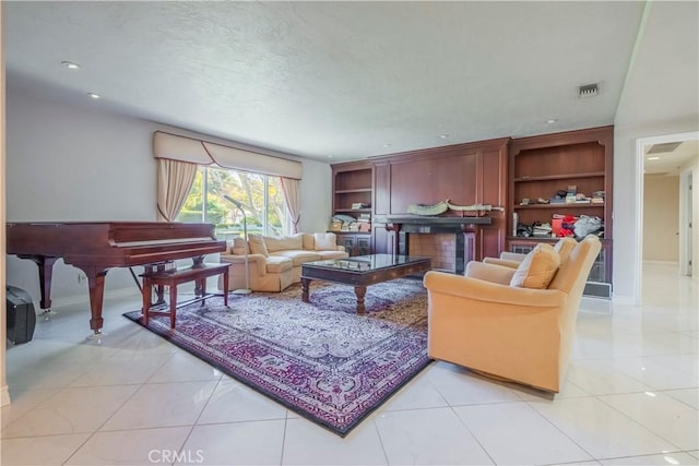 tiled living room featuring built in features