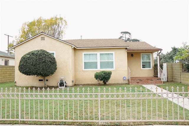 view of front of house with a front lawn