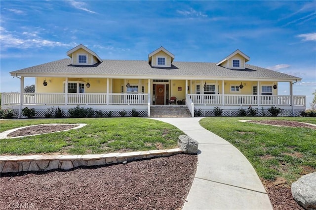 farmhouse inspired home with a front lawn and a porch