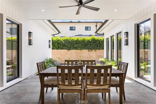 view of patio featuring ceiling fan