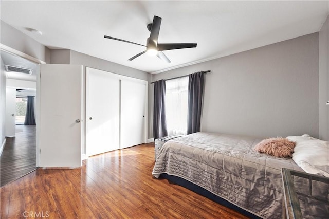 bedroom featuring ceiling fan and hardwood / wood-style flooring