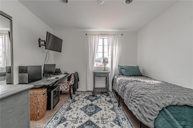 bedroom featuring carpet