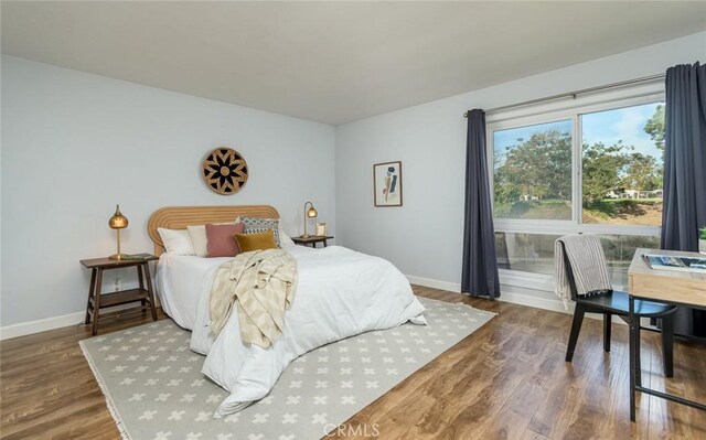 bedroom featuring hardwood / wood-style floors