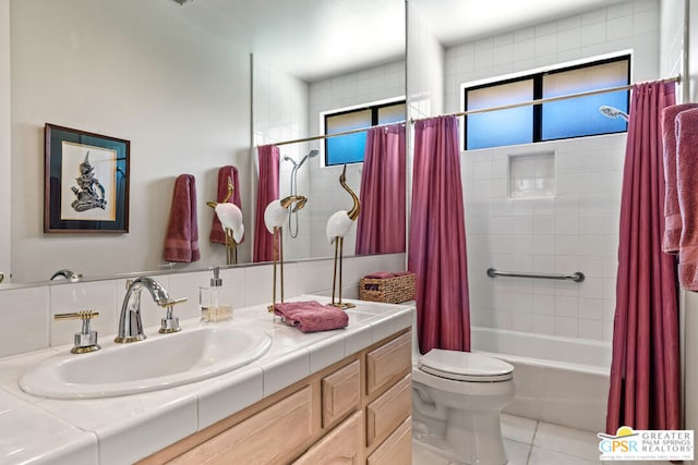 full bathroom featuring tile patterned flooring, vanity, shower / bath combination with curtain, and toilet