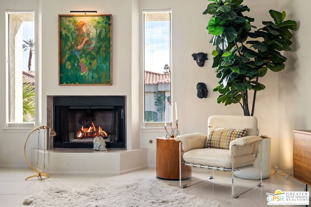 sitting room featuring light tile patterned flooring