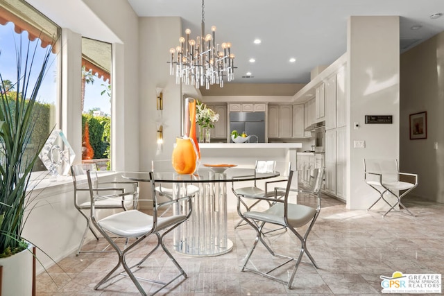 dining room featuring a notable chandelier