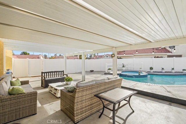 view of patio with a fenced in pool and an outdoor living space