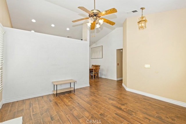 unfurnished room featuring ceiling fan and lofted ceiling