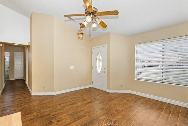 foyer entrance featuring ceiling fan and dark wood-type flooring