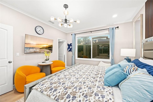 bedroom featuring crown molding, a chandelier, and hardwood / wood-style floors